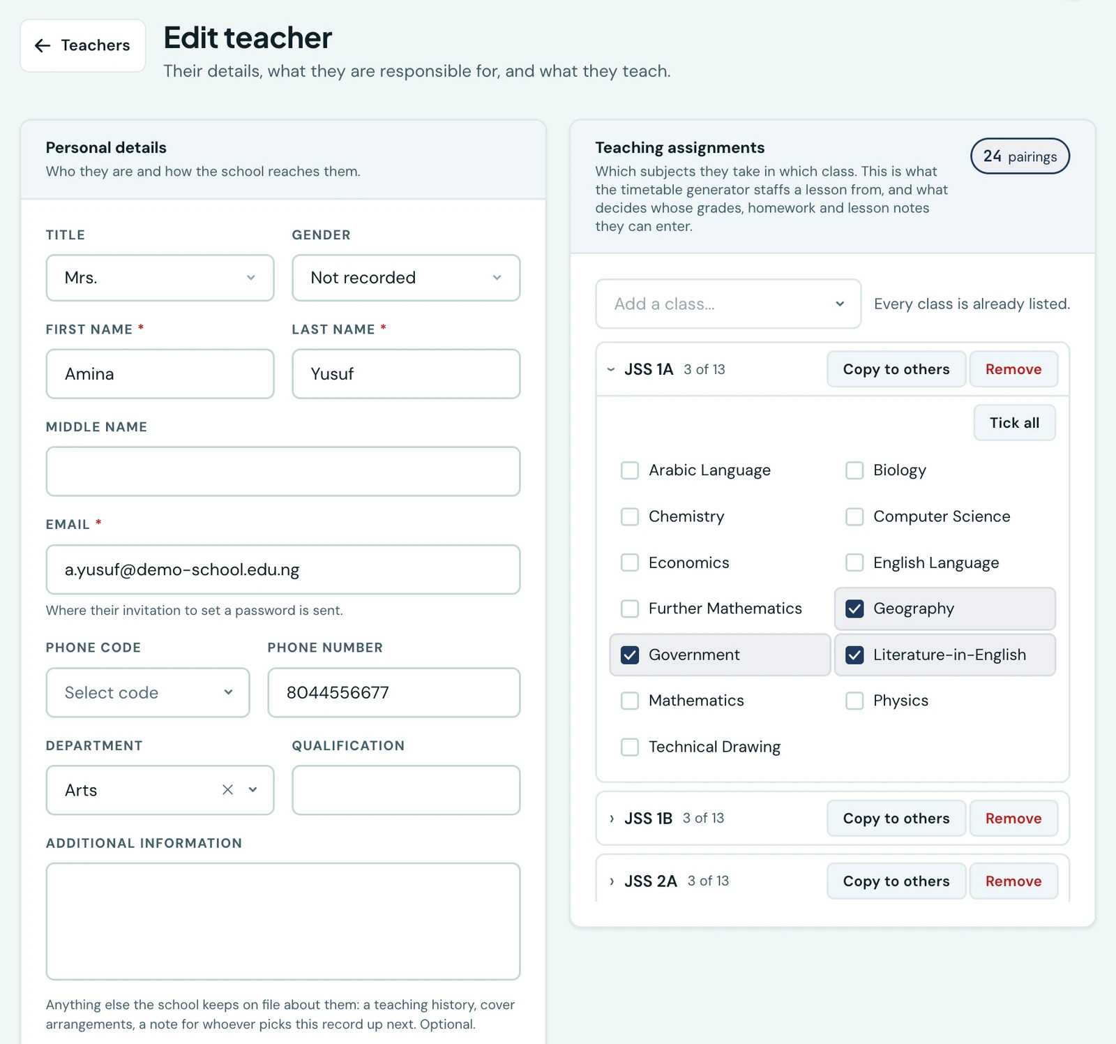 The Edit teacher page for Amina Yusuf. On the left, a Personal details card holding title, gender, first and last name, email, phone, department, qualification and a free-text note. On the right, a Teaching assignments card reading 24 pairings, described as which subjects they take in which class. Under an Add a class box, one row per class: JSS 1A is open and reads 3 of 13, showing the school's thirteen subjects as tick boxes with Geography, Government and Literature-in-English ticked, and a Tick all button above them. JSS 1B and JSS 2A follow, closed, each reading 3 of 13. Every row carries a Copy to others button and a Remove button.