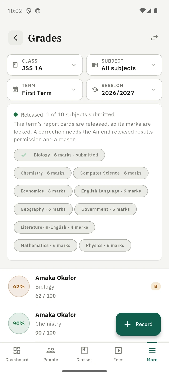 The Grades screen of the 1410SMS Android app filtered to JSS 1A, First Term, 2026/2027. A panel above the marks reads Released, 1 of 10 subjects submitted, and explains that this term's report cards are released so its marks are locked, and that a correction needs the Amend released results permission and a reason. Beneath it, one chip per subject gives its number of marks, Biology ticked as submitted, then Chemistry, Computer Science, Economics, English Language, Geography, Government, Literature-in-English, Mathematics and Physics. Amaka Okafor's Biology mark of 62 per cent follows.