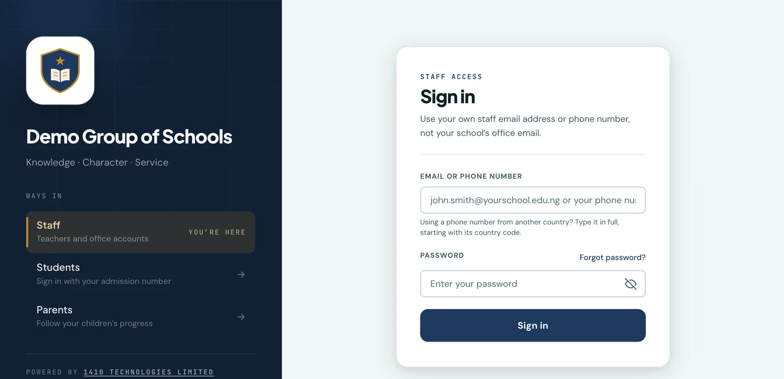 The staff sign-in screen for Demo Group of Schools. A dark panel on the left carries the school crest, its name and motto, and a list of ways in with Staff highlighted as You're here, above Students and Parents. On the right a card headed Staff access, Sign in, with a single field labelled Email or phone number, a hint that a phone number from another country is typed in full starting with its country code, a password field, and a Sign in button.