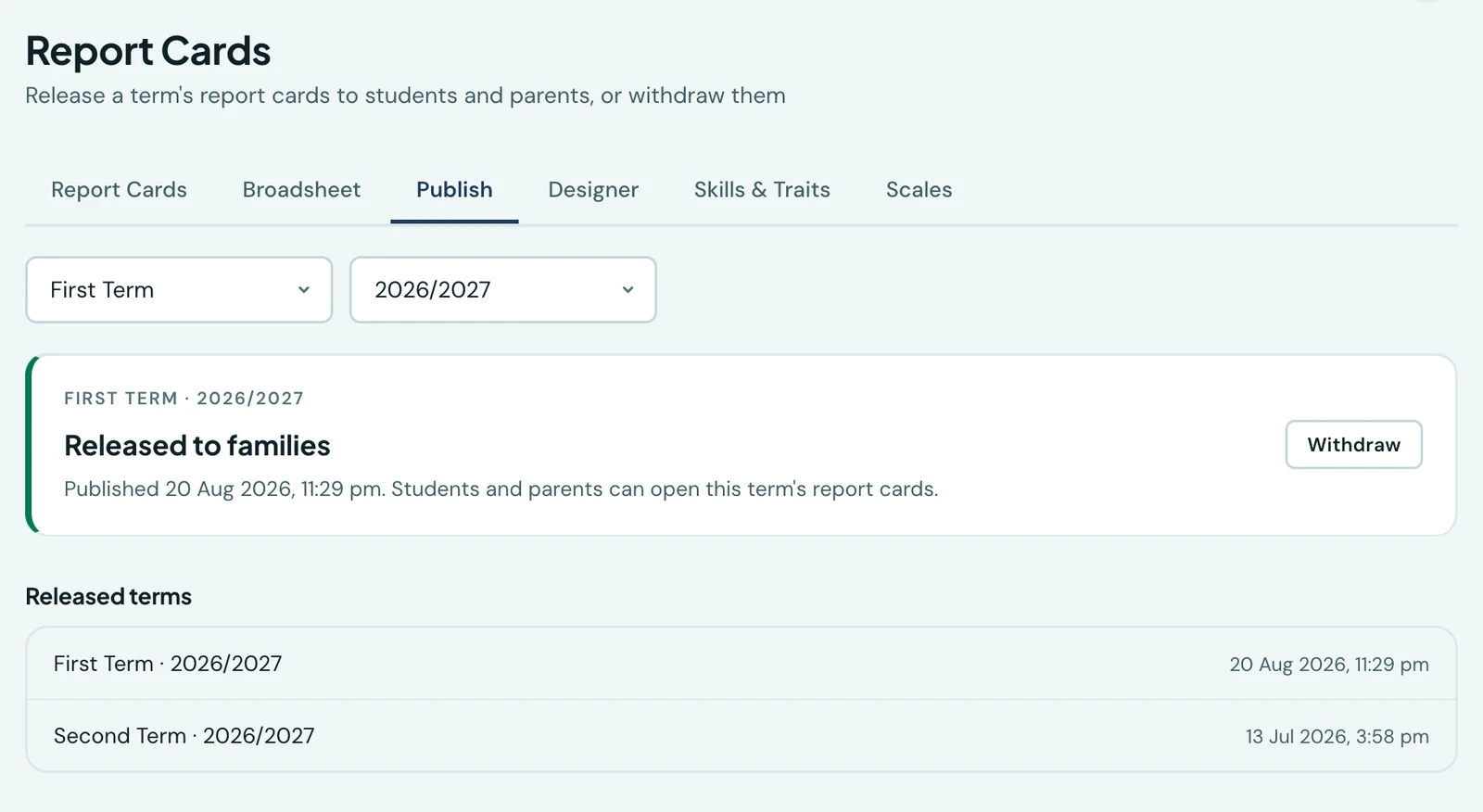 The Publish tab of the Report Cards page, beside Report Cards, Broadsheet, Designer, Skills & Traits and Scales. A term selector reads First Term and a session selector 2026/2027. Below them a panel headed FIRST TERM · 2026/2027 says Released to families, with a Withdraw button, and a line reading Published 20 Aug 2026, 11:29 pm. Students and parents can open this term's report cards. Beneath, a Released terms list shows First Term 2026/2027 and Second Term 2026/2027 with the dates each went out.