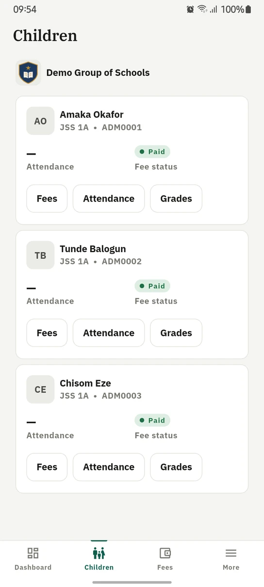 The 1410SMS Android app Children screen for a parent: the school's crest and name above three cards, one each for Amaka Okafor, Tunde Balogun and Chisom Eze, every card giving the child's class and admission number, their attendance and a Paid fee-status tag, and Fees, Attendance and Grades buttons