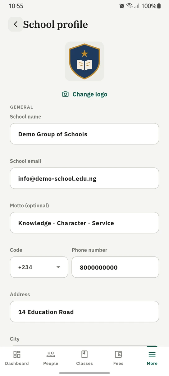 The 1410SMS Android app School profile screen: the school crest with a Change logo button beneath it, then form fields holding the school name Demo Group of Schools, its email address, its motto, a dialling code and telephone number side by side, and its street address